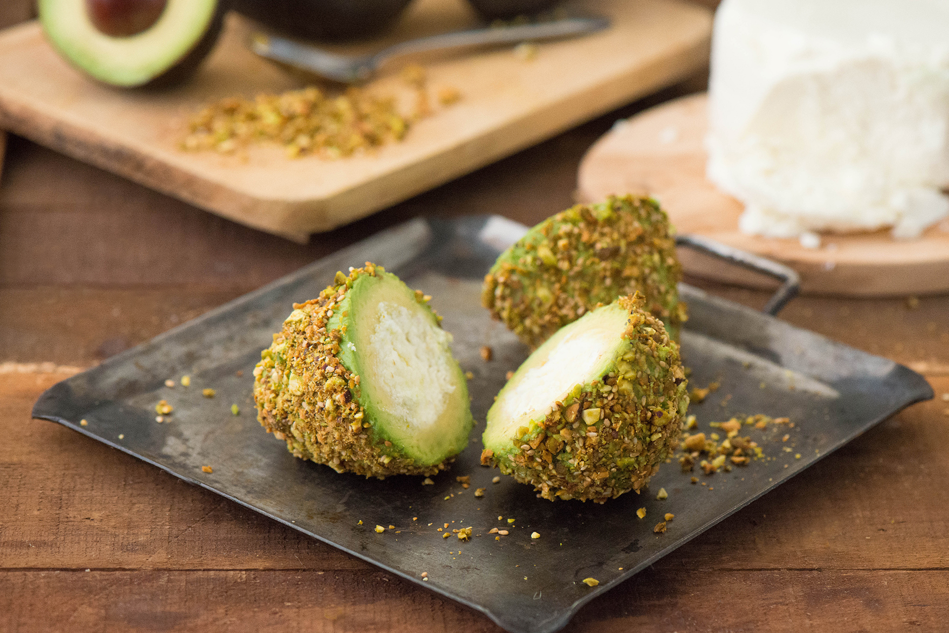 Requeson-Stuffed Avocados with Pistachios and Toasted Sesame Seeds