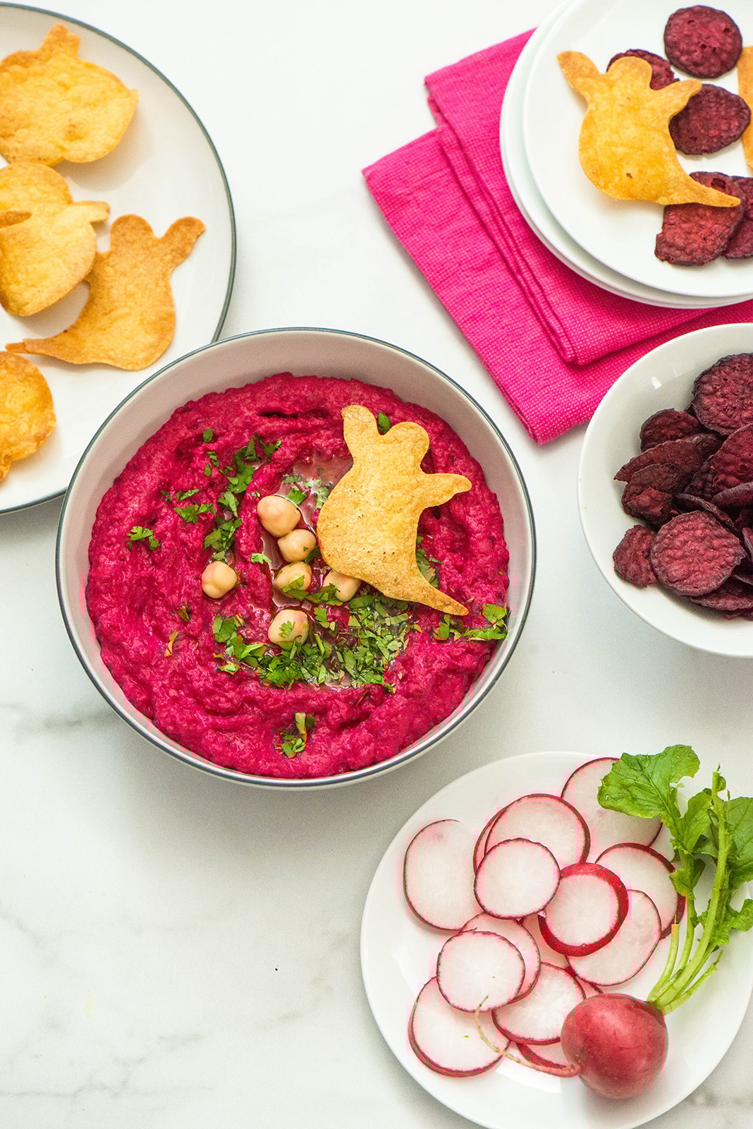 Hummus Beet Dip with Halloween Shaped Tortilla Chips Nibbles and Feasts