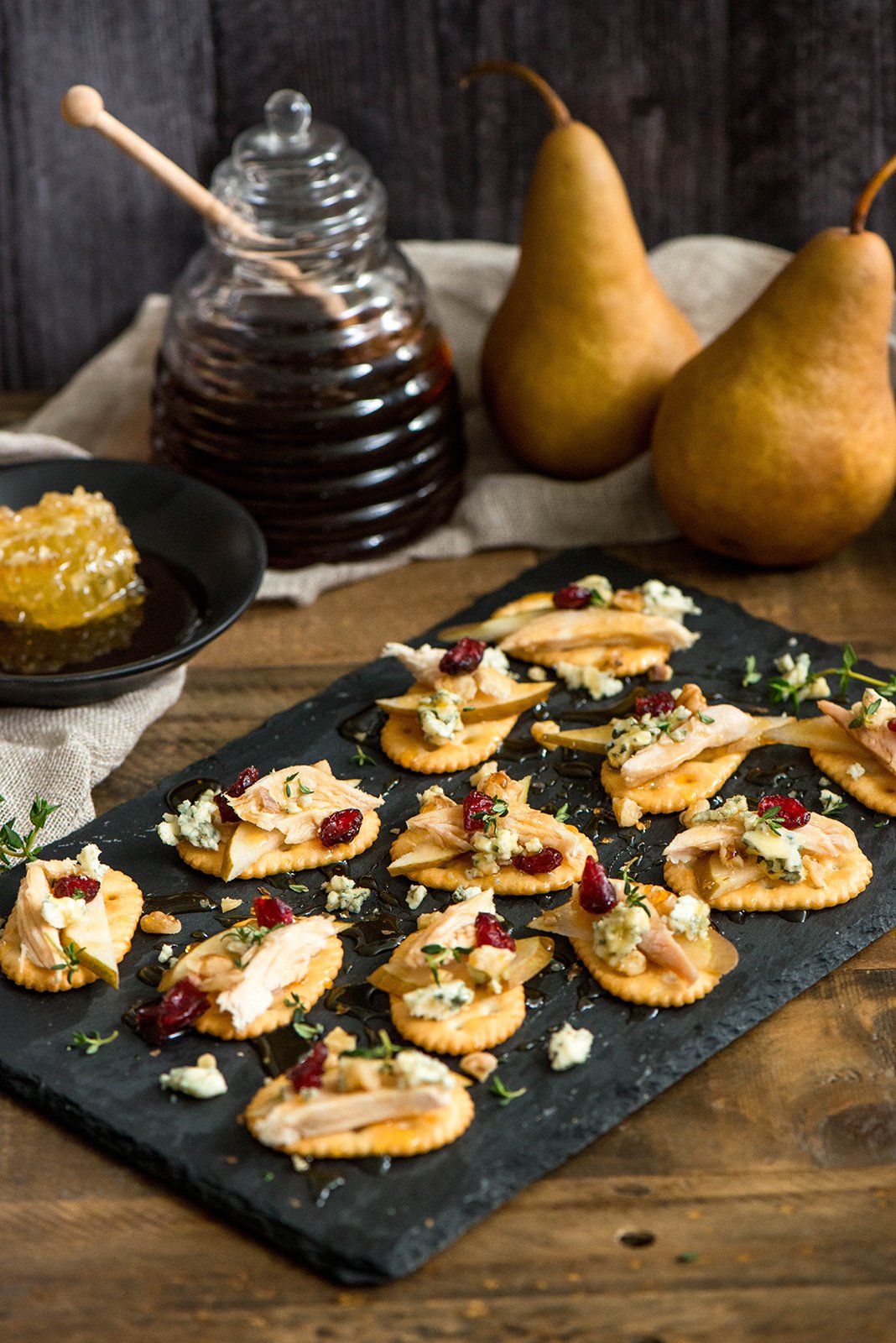 Pear Blue Cheese Crackers with Honey Nibbles and Feasts